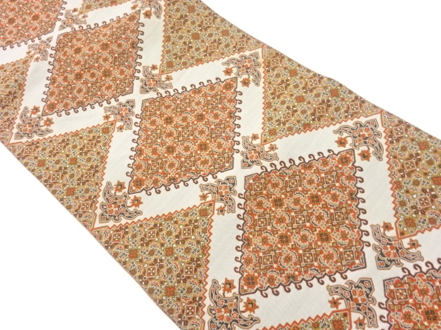 菱に花唐草尽くし模様織出し名古屋帯